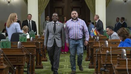 Dr. Jackson escorts Jess Anthony Sanchez on the Assembly Floor