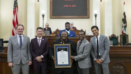 Dr. Jackson and Rev. Benita Ramsey pose for group photo with Speaker Rivas